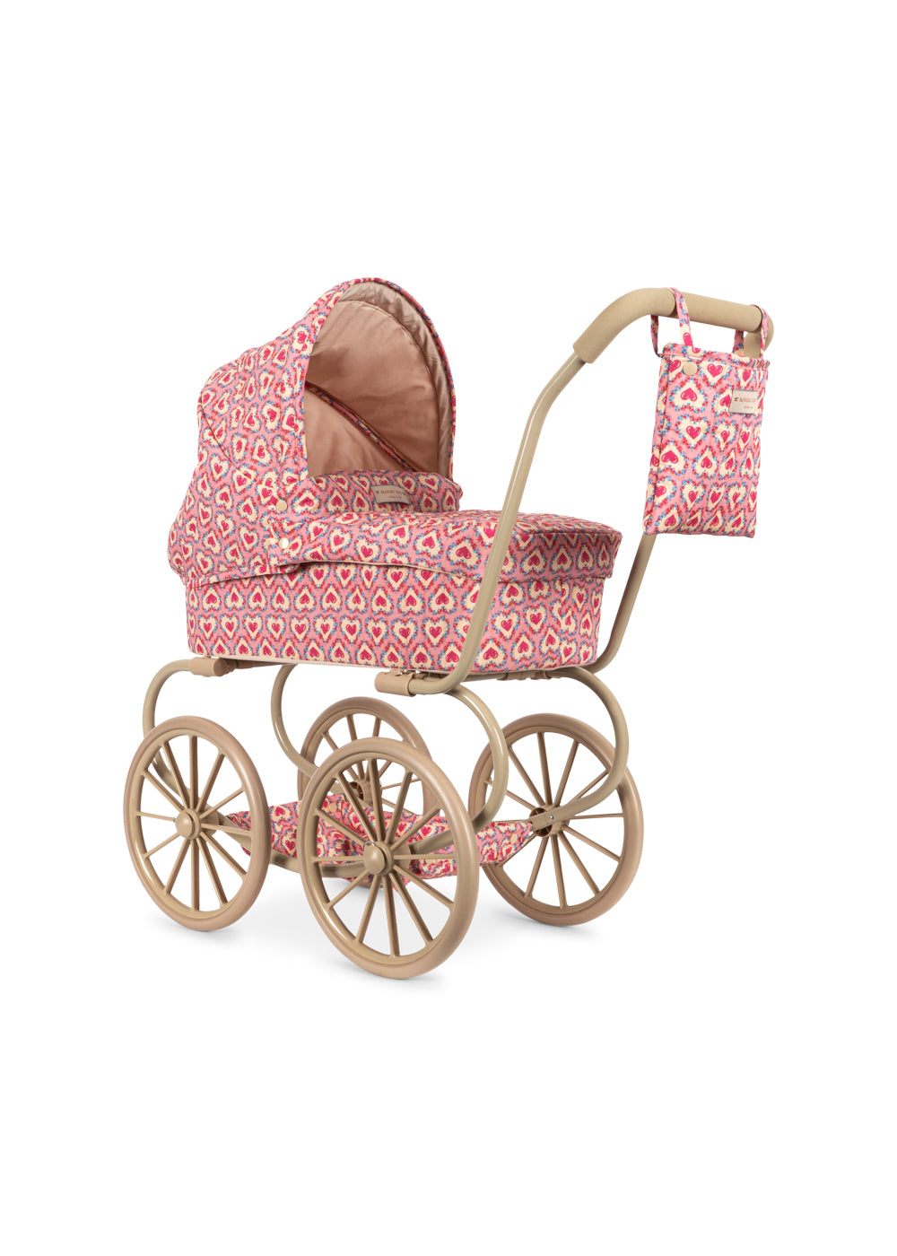 Close-up of floral fabric and scalloped edge on doll pram