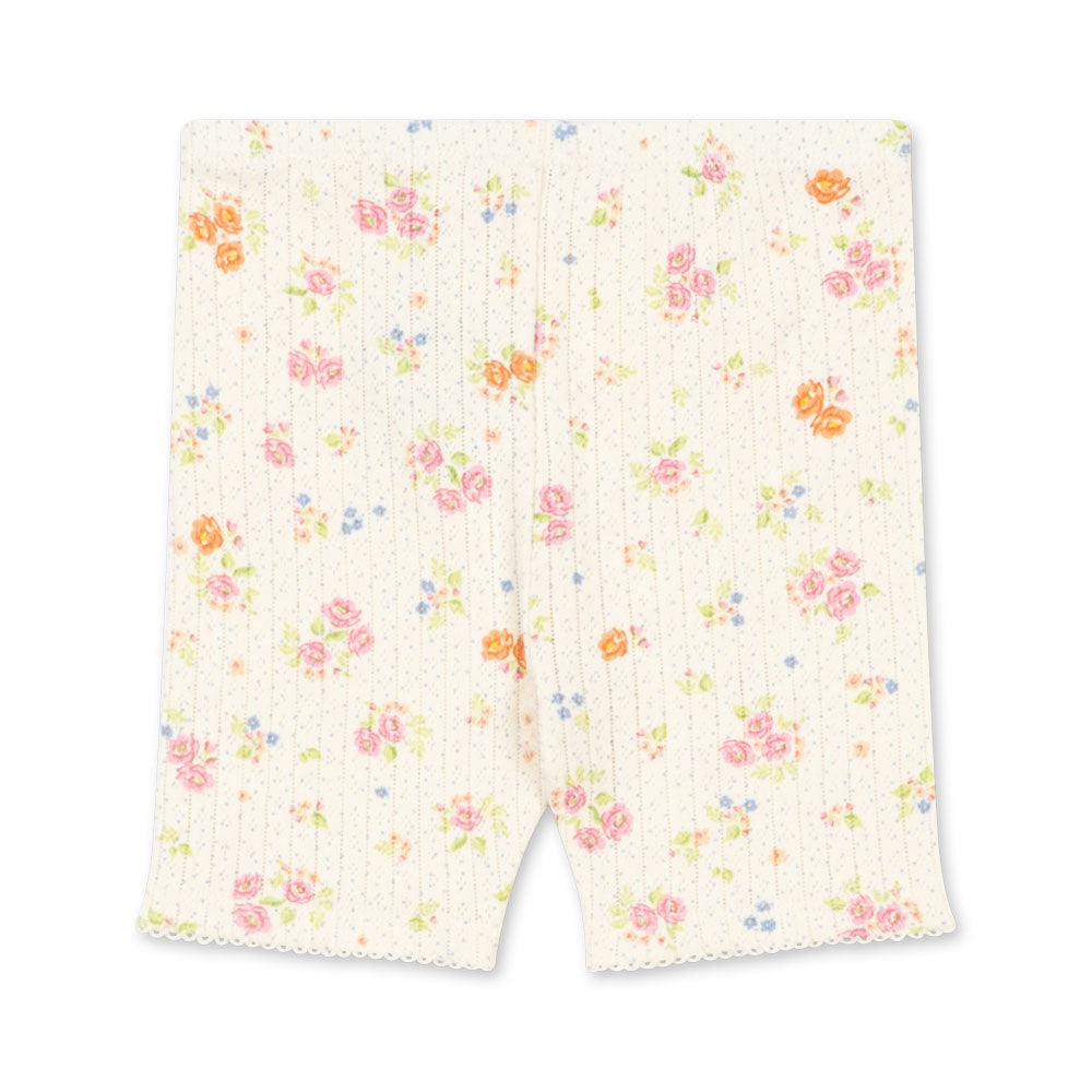 Floral-patterned shorts on a white background