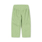 Light green cropped pants with a white polka dot pattern, featuring an elastic waistband and side pockets, shown flat on a white background.