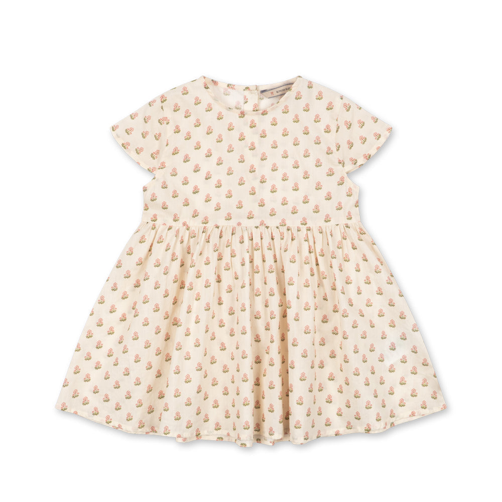 Beige dress with floral pattern on a white background