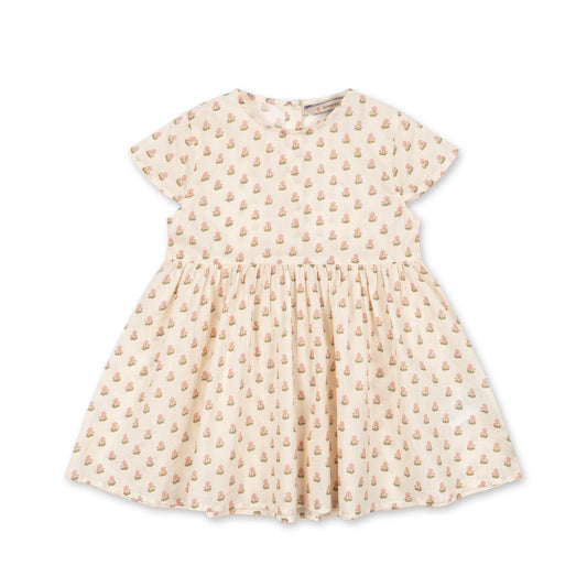 Beige dress with floral pattern on a white background