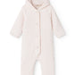 Pink baby snowsuit with a hood on a white background