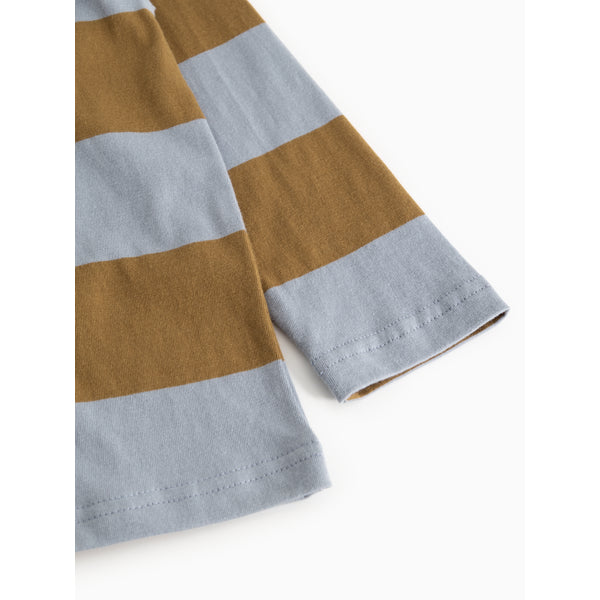 A close-up of a striped garment sleeve with alternating wide brown and light blue-gray horizontal bands, shown on a plain white background.