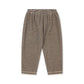 A pair of children's knit pants with horizontal stripes in beige and black, featuring an elastic waistband, shown flat against a white background.