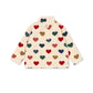 A cream-colored fleece jacket with a high collar, featuring an all-over pattern of small hearts in red, green, navy blue, and brown, displayed on a clean white background.