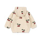 A cream-colored sherpa hoodie with an all-over cherry print, shown from the back on a plain white background.