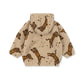 A beige sherpa fleece hooded jacket with an all-over print of orange and black tiger figures and small gold stars, shown against a plain white background.