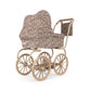 Vintage-style doll pram with leopard print cover on a white background