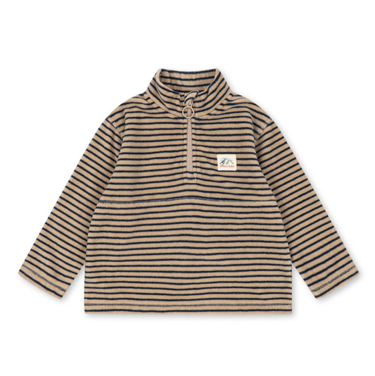 A long-sleeve quarter-zip pullover top with horizontal beige and brown stripes, featuring a small white brand patch on the left chest, displayed on a clean white background.