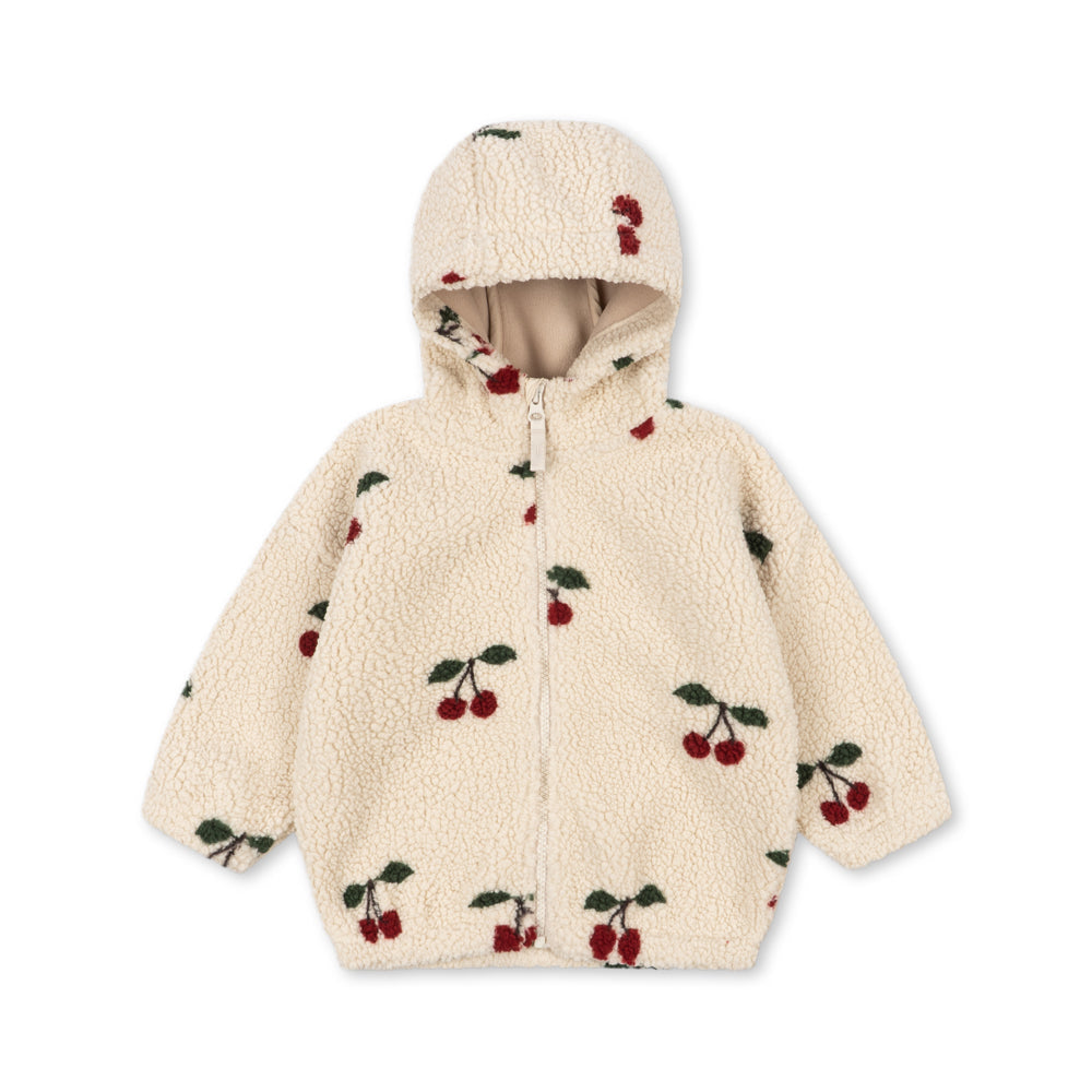A cream-colored sherpa zip-up hoodie with an all-over cherry print, featuring red cherries with green leaves and a matching cherry detail on the hood, shown against a plain white background.