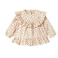 Floral blouse with ruffled sleeves on a white background