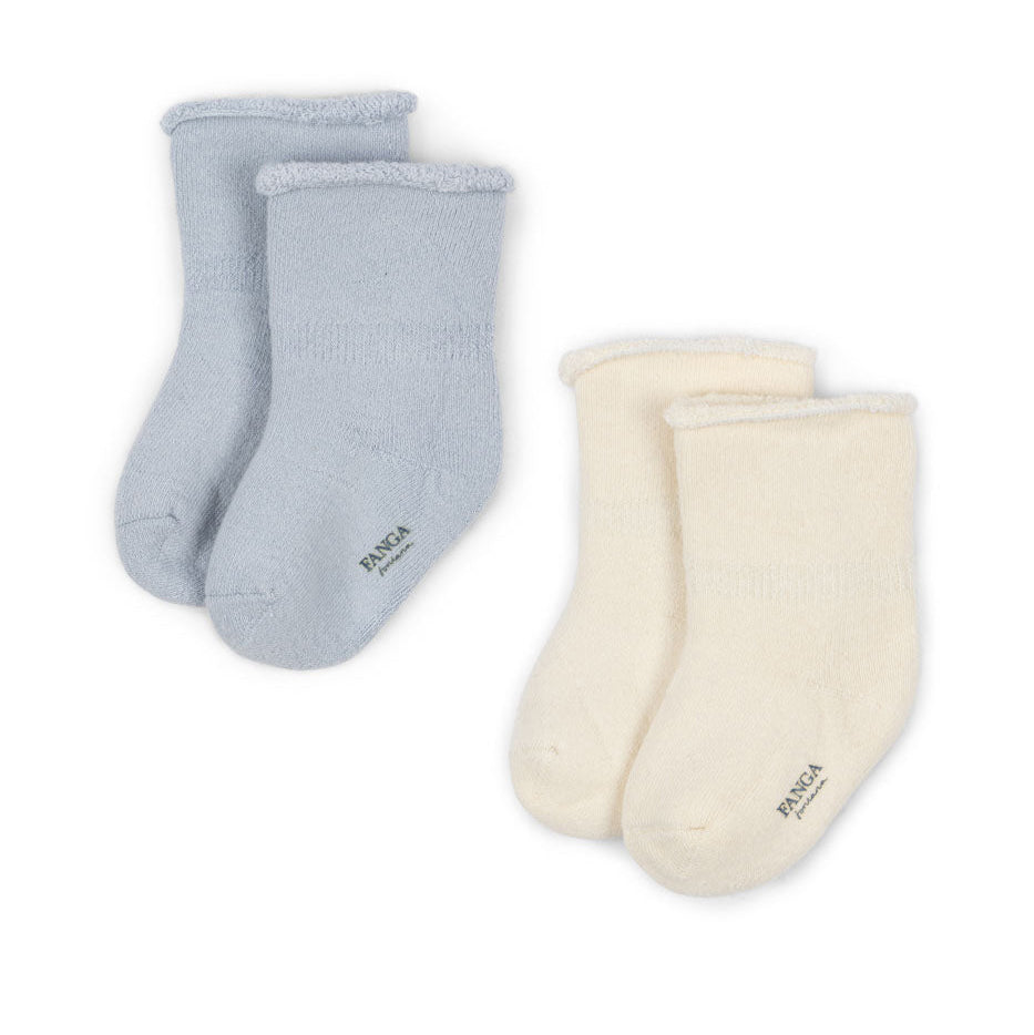 Two pairs of baby socks, one blue and one cream, on a white background with a small duck illustration.