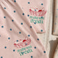 Pink fabric with blue polka dots and 'Fruity and Fresh' text design.
