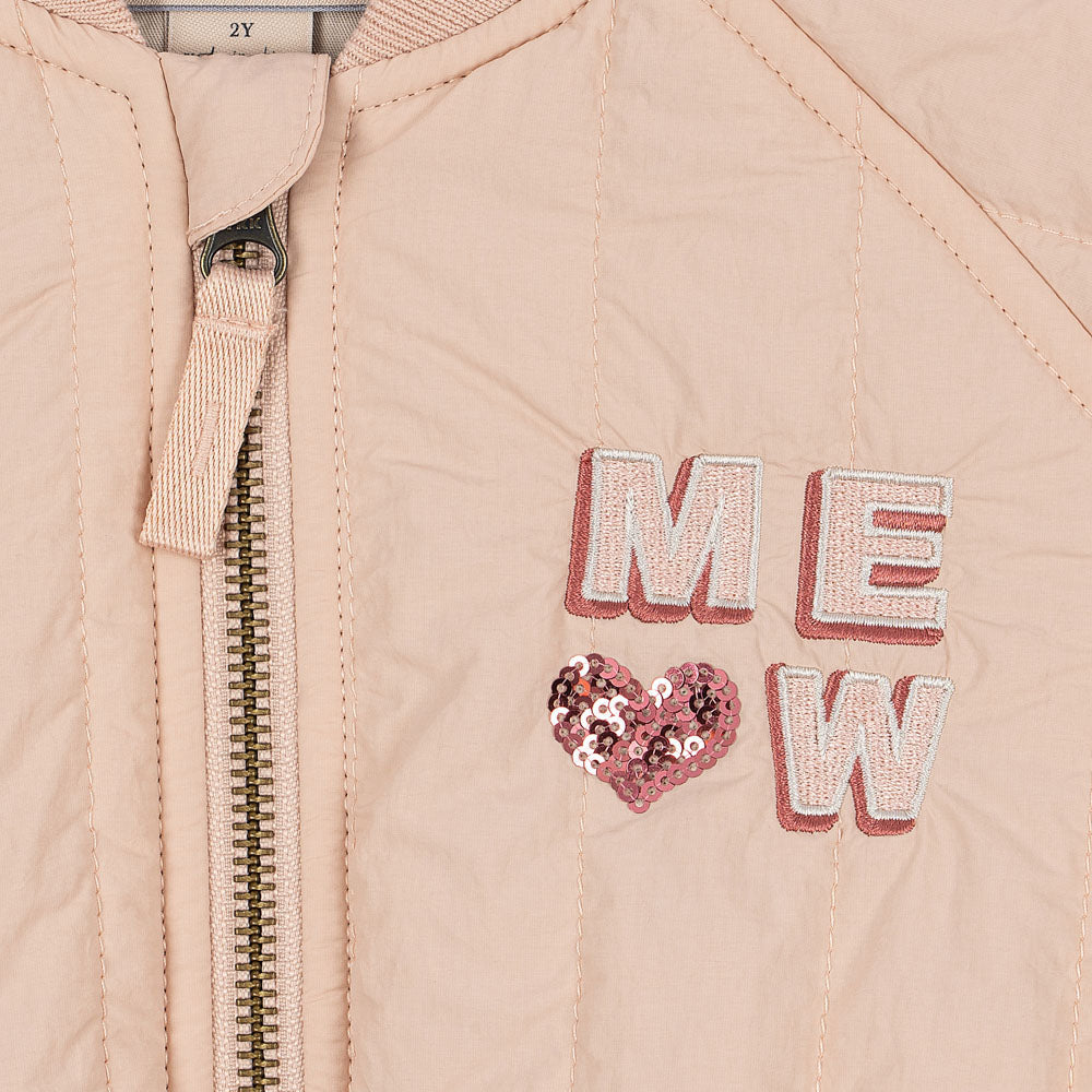 Beige jacket with 'MEOW' text and heart design, brand 'Konges Sløjd' visible.
