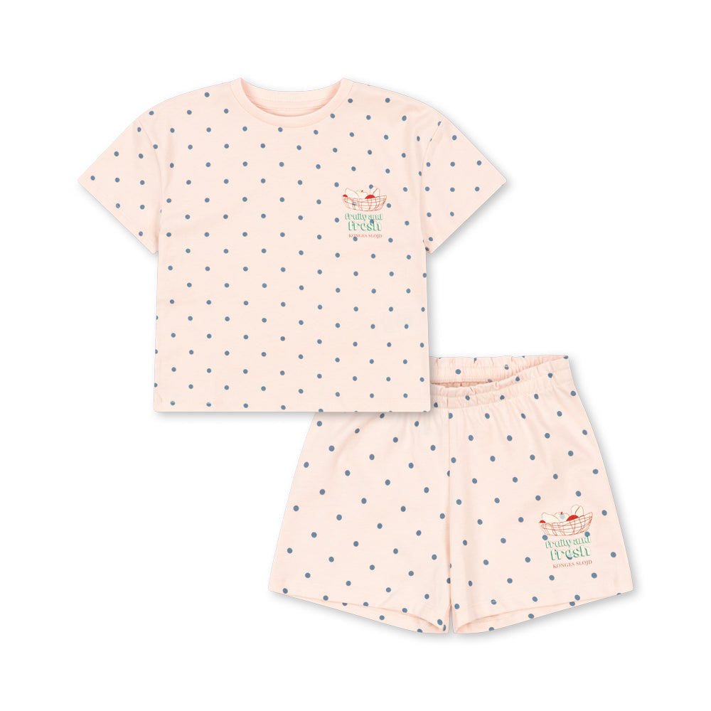Pink pajama set with small patterns on a white background