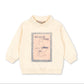Light pink sweater with graphic design on a white background