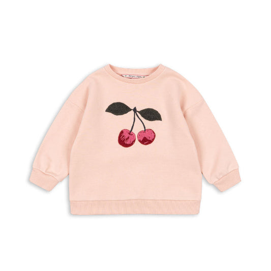 Konges Slojd peach kids sweatshirt with cherry print on front