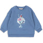 Child wearing Lou bodysuit in soft cotton neutral colour