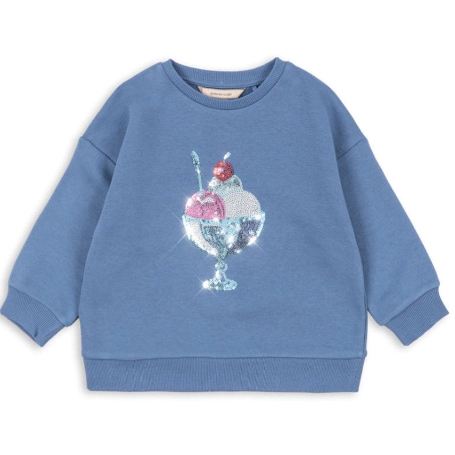 Child wearing Lou bodysuit in soft cotton neutral colour