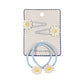 Set of hair ties with floral designs on a branded card against a white background