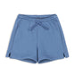 Blue organic cotton boys shorts with a tie waist on a white background