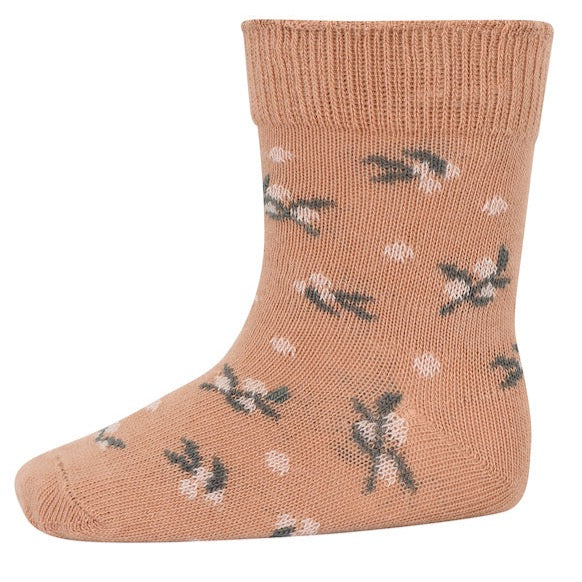 A comfortable and cosy socks with a flower print.