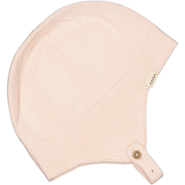 A beautiful baby hat with chinstrap perfect for spring babies in a delicate coral pink from Sonny Bear