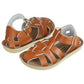 A pair of boys brown leathe rsandals with buckel fastening on the side