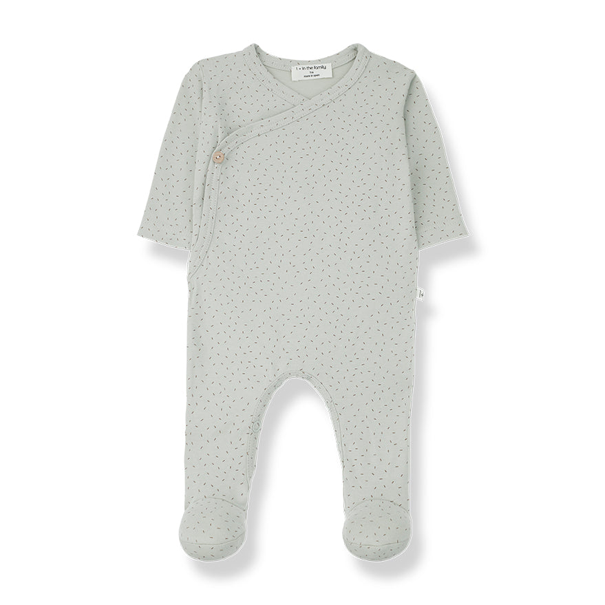 Sage green crossover body romper, with snappers on the legs for changing, a little tie detail inside to keep baby comfort